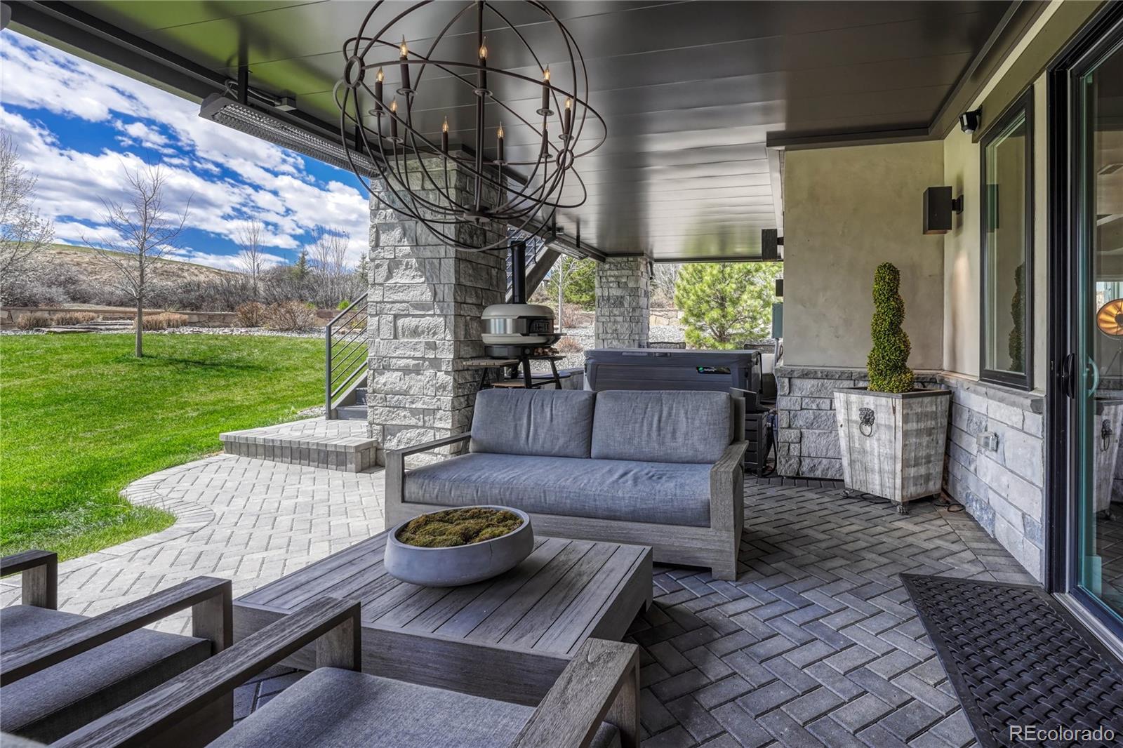 5151 Raintree Circle Parker, CO 80134 - Photo 43 of 50 a view of outdoor sitting area with furniture