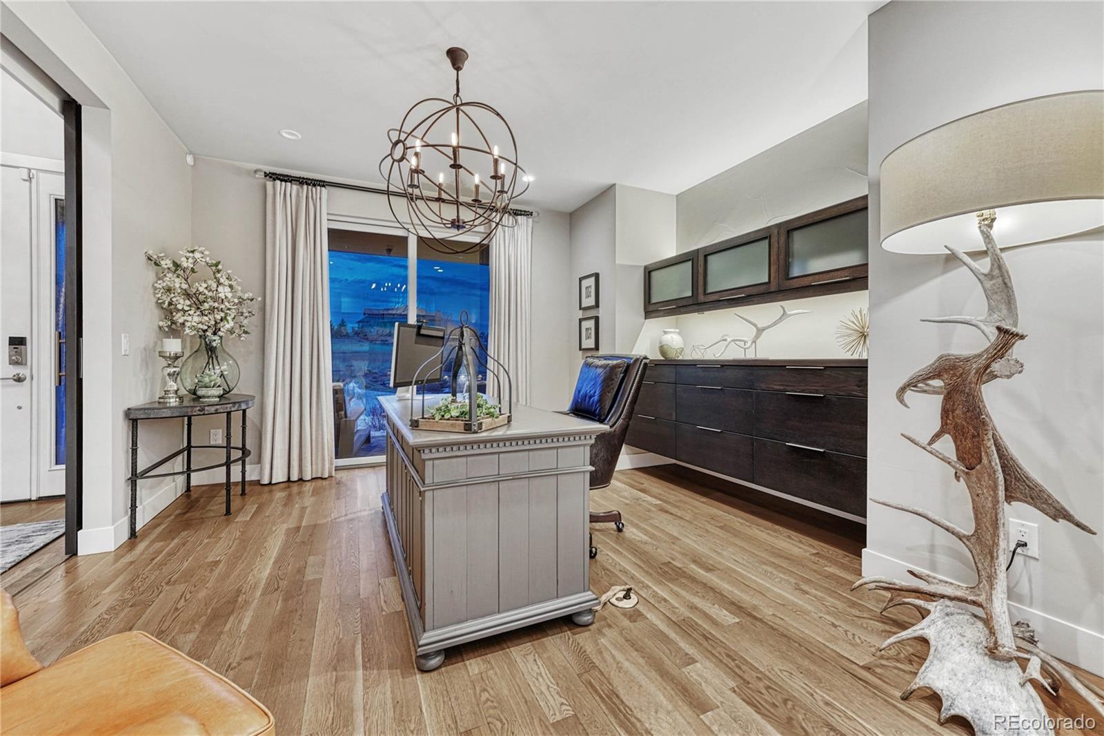 5151 Raintree Circle Parker, CO 80134 - Photo 5 of 50 a bedroom with furniture and window