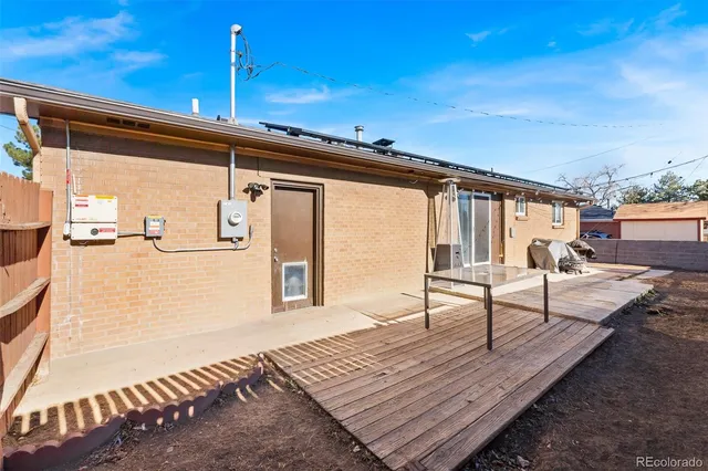 a view of a balcony with wooden floor