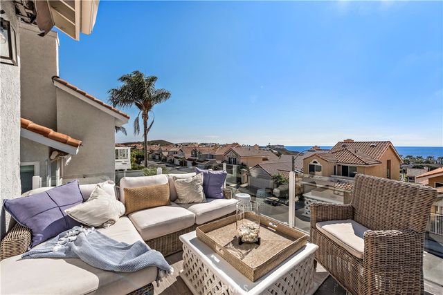 a view of a terrace with couches and a table