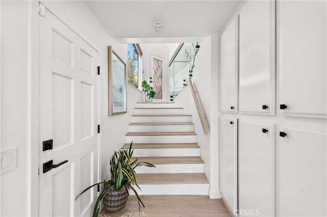 a view of entryway with wooden floor