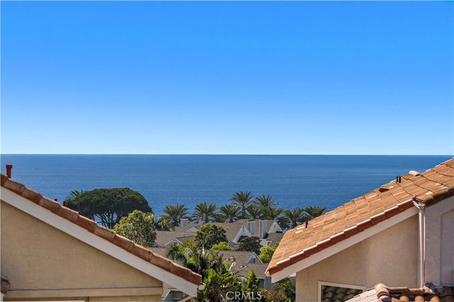 a view of a green field with an outdoor space