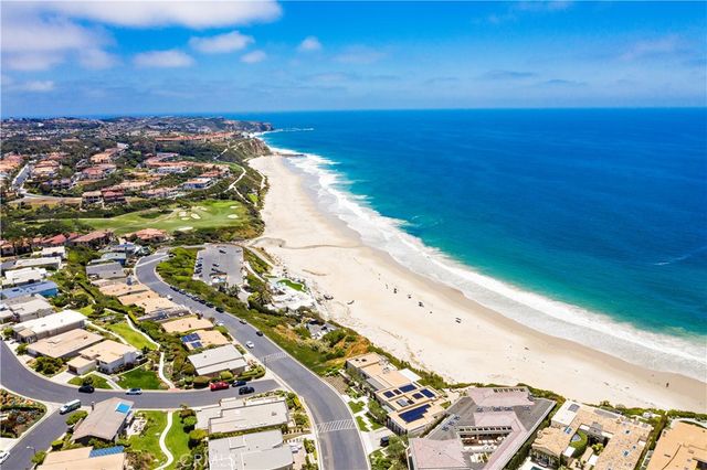 an aerial view of beach and ocean