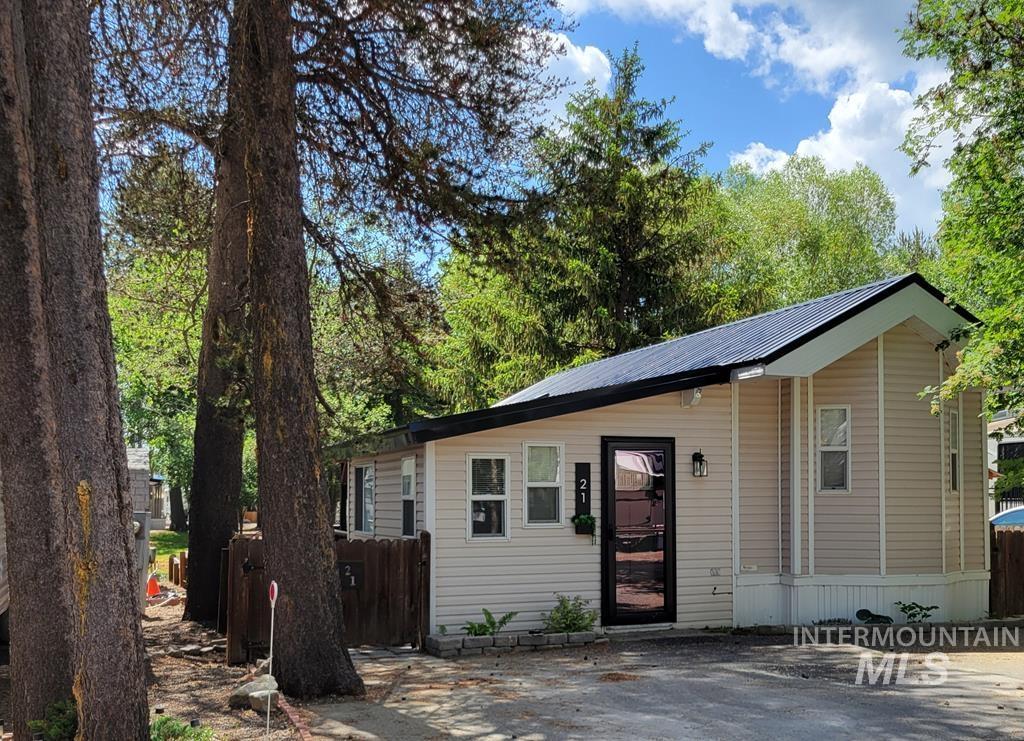 21 E Street Cascade, ID 83611 - Photo 2 of 26 View of front of property featuring a metal roof
