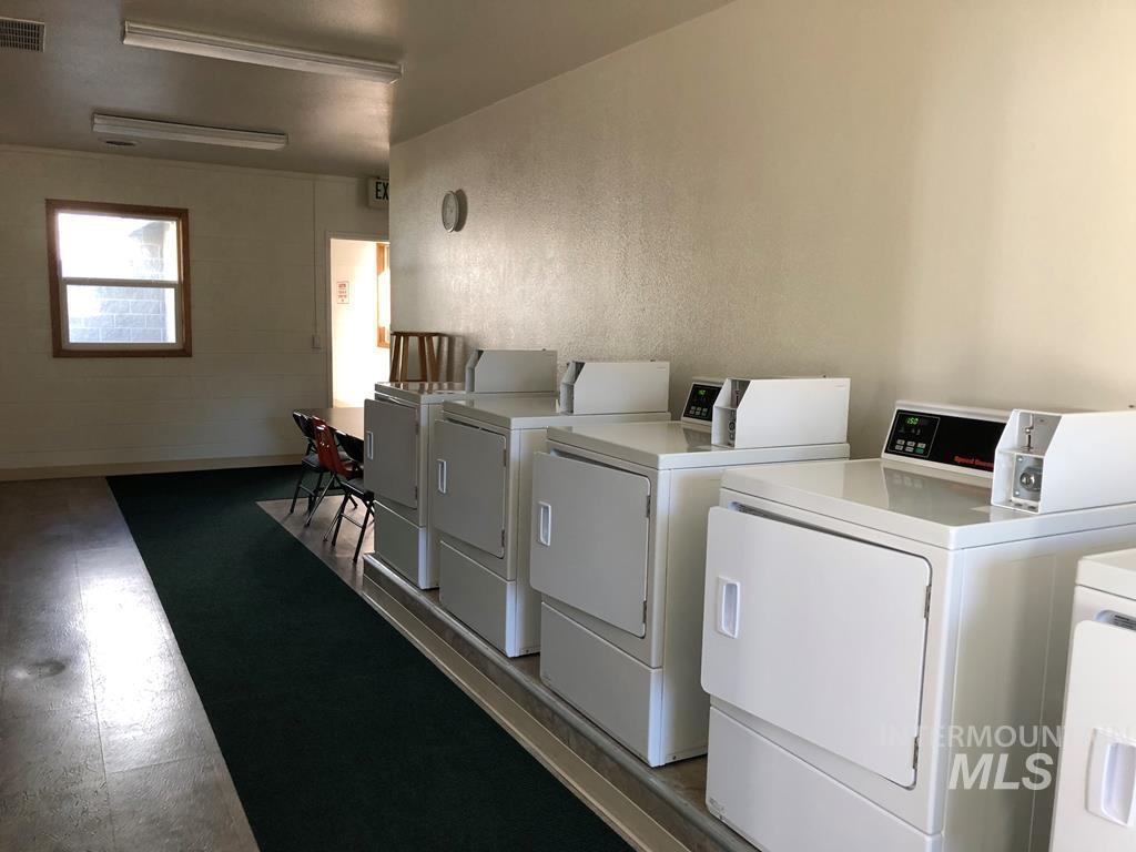 21 E Street Cascade, ID 83611 - Photo 22 of 26 Communal laundry room featuring washer and dryer