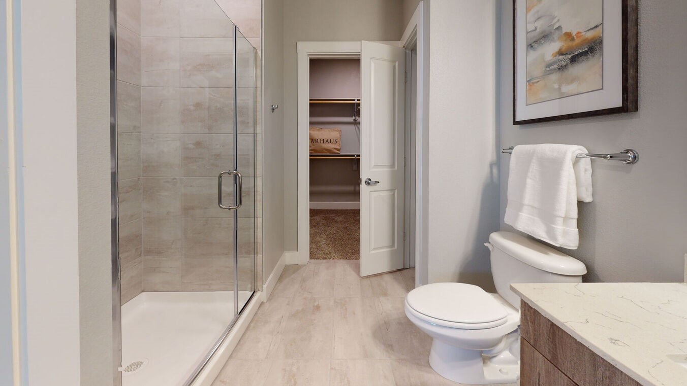 24002 Colonial Parkway, Unit 4331 Katy, TX 77493 - Photo 18 of 31 a bathroom with a toilet and a shower