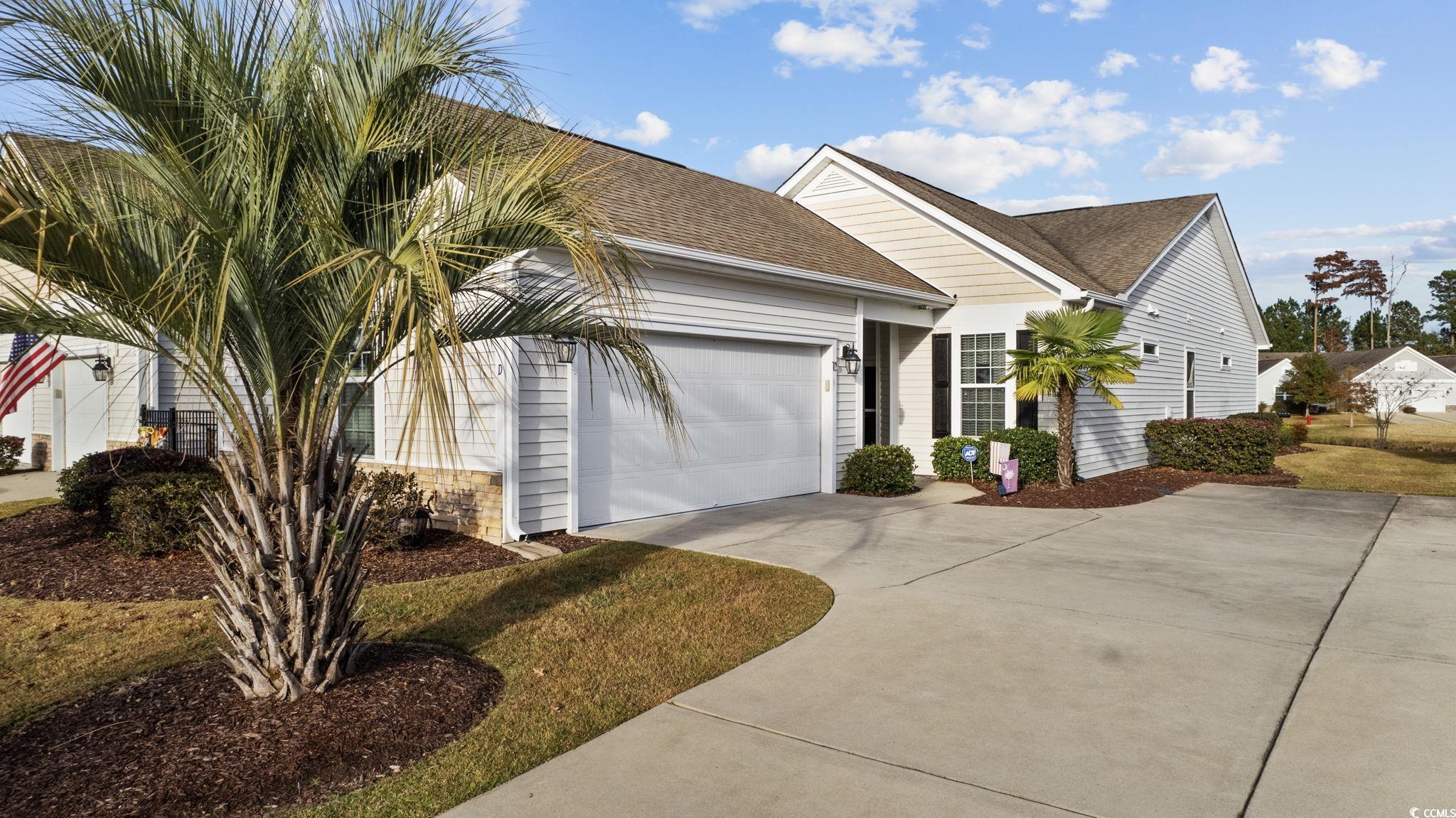 1602 Palmina Loop, Unit 34D Myrtle Beach, SC 29588 - Photo 1 of 28 Single story home featuring a garage
