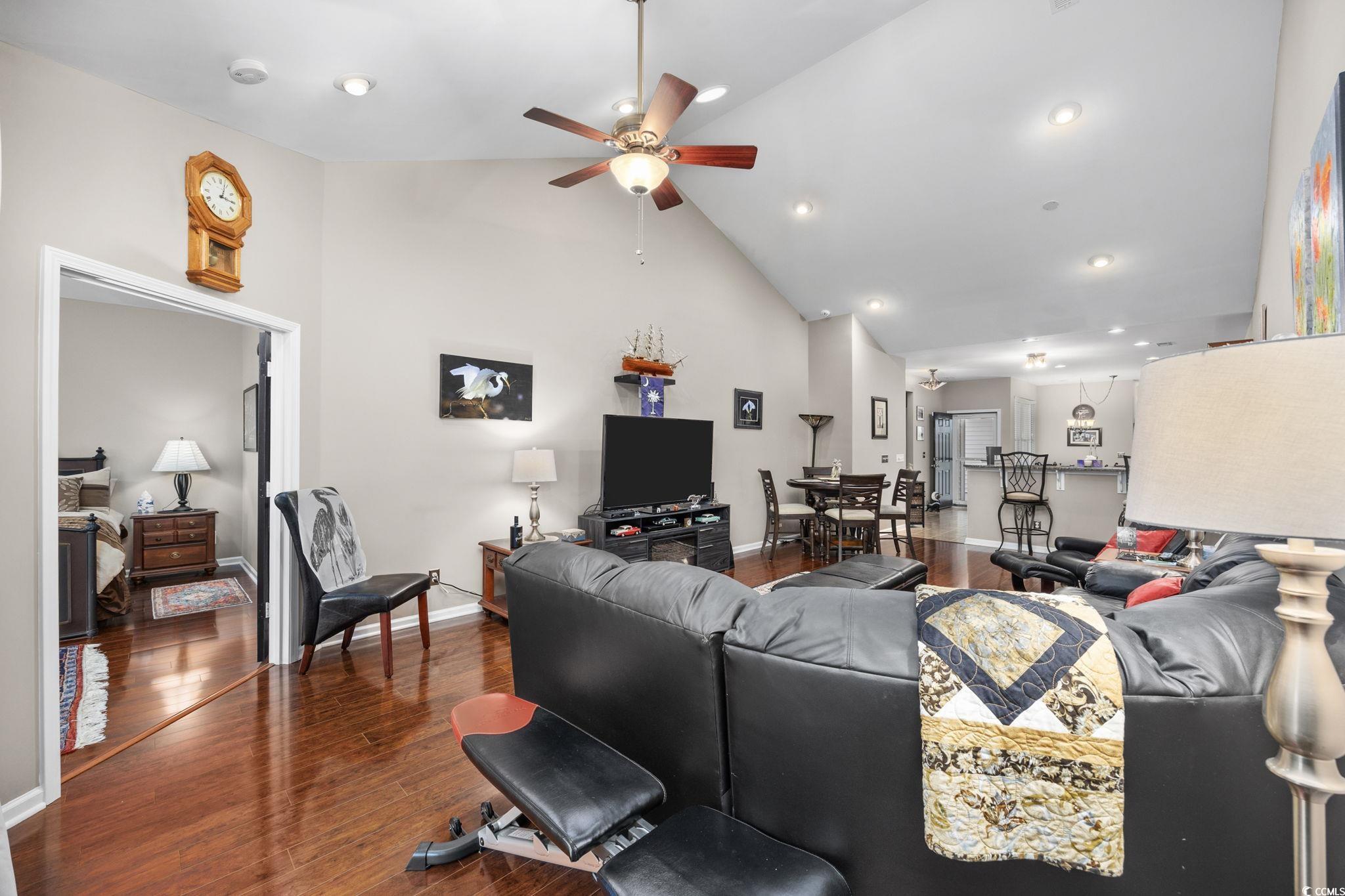 1602 Palmina Loop, Unit 34D Myrtle Beach, SC 29588 - Photo 13 of 28 Living room featuring wood-type flooring, high vau