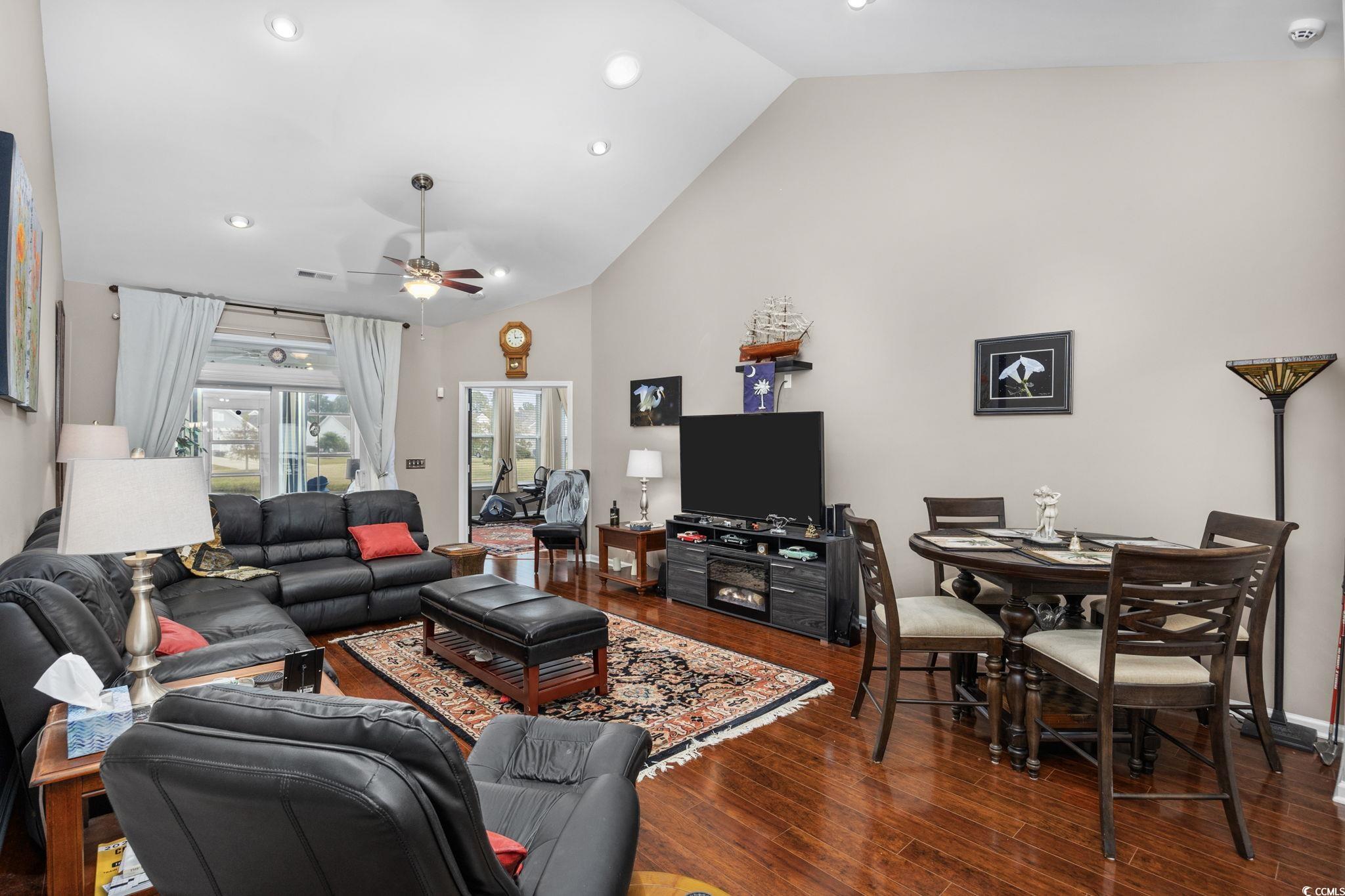 1602 Palmina Loop, Unit 34D Myrtle Beach, SC 29588 - Photo 15 of 28 Living room featuring ceiling fan, wood-type floor
