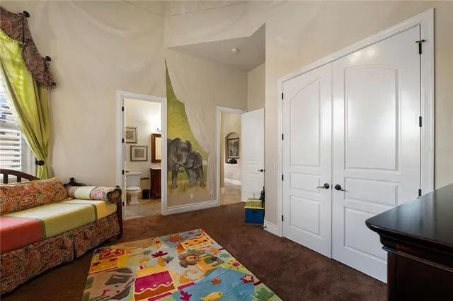 a bathroom with a granite countertop sink toilet a mirror and shower