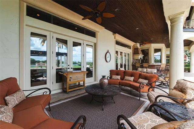 a view of a backyard with swimming pool