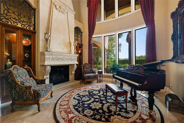 a large kitchen with cabinets table and chairs
