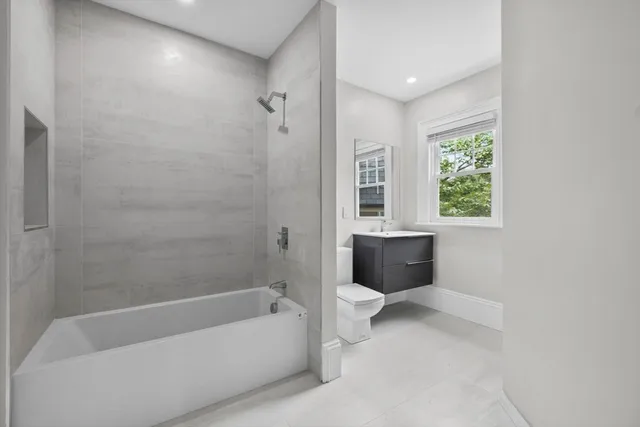 a view of a living room with windows