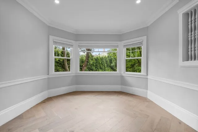 an empty room with windows