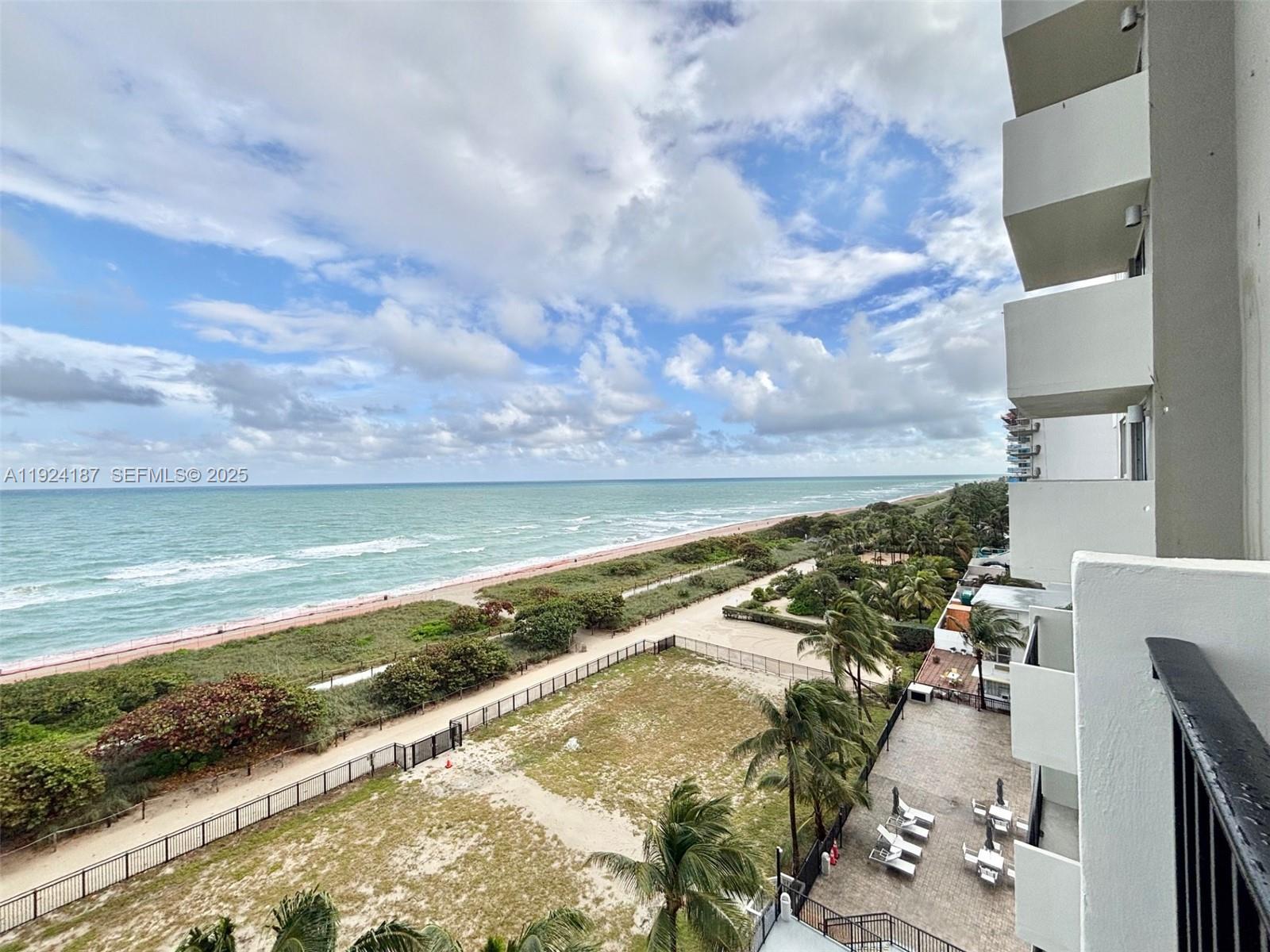 9273 Collins Avenue, Unit 705 Surfside, FL 33154 - Photo 3 of 40 a view of an ocean and beach