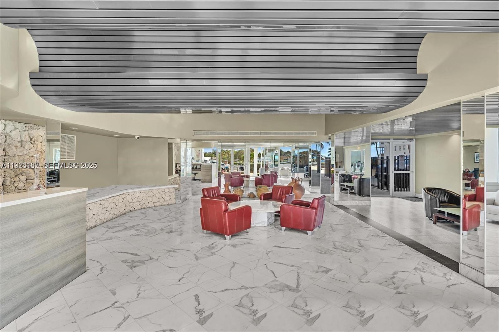 9273 Collins Avenue, Unit 705 Surfside, FL 33154 - Photo 36 of 40 a room with furniture