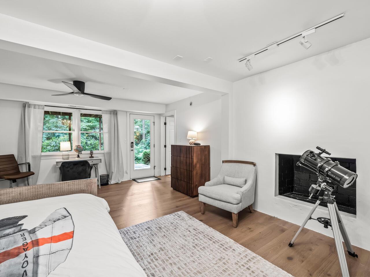 300 Dartmouth Road Raleigh, NC 27609 - Photo 21 of 28 a living room with furniture and a large window