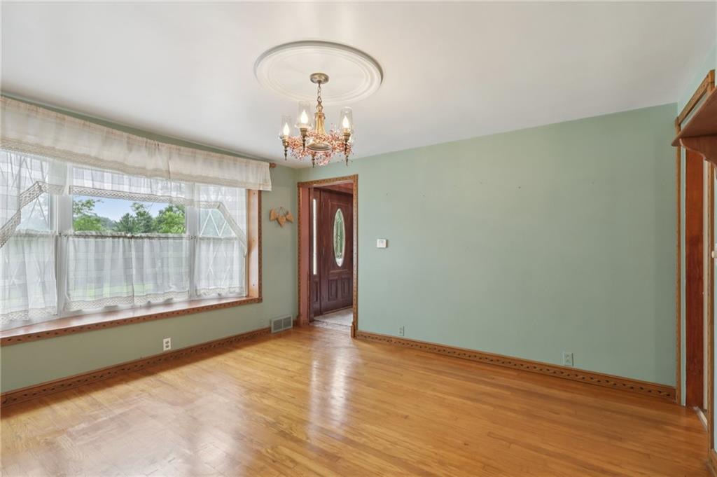 714 Colonial Drive Apollo, PA 15613 - Photo 13 of 32 a view of empty room with wooden floor and fan