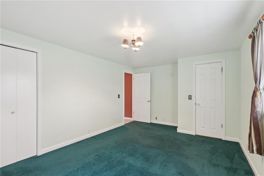 714 Colonial Drive Apollo, PA 15613 - Photo 20 of 32 a view of an empty room with a ceiling fan