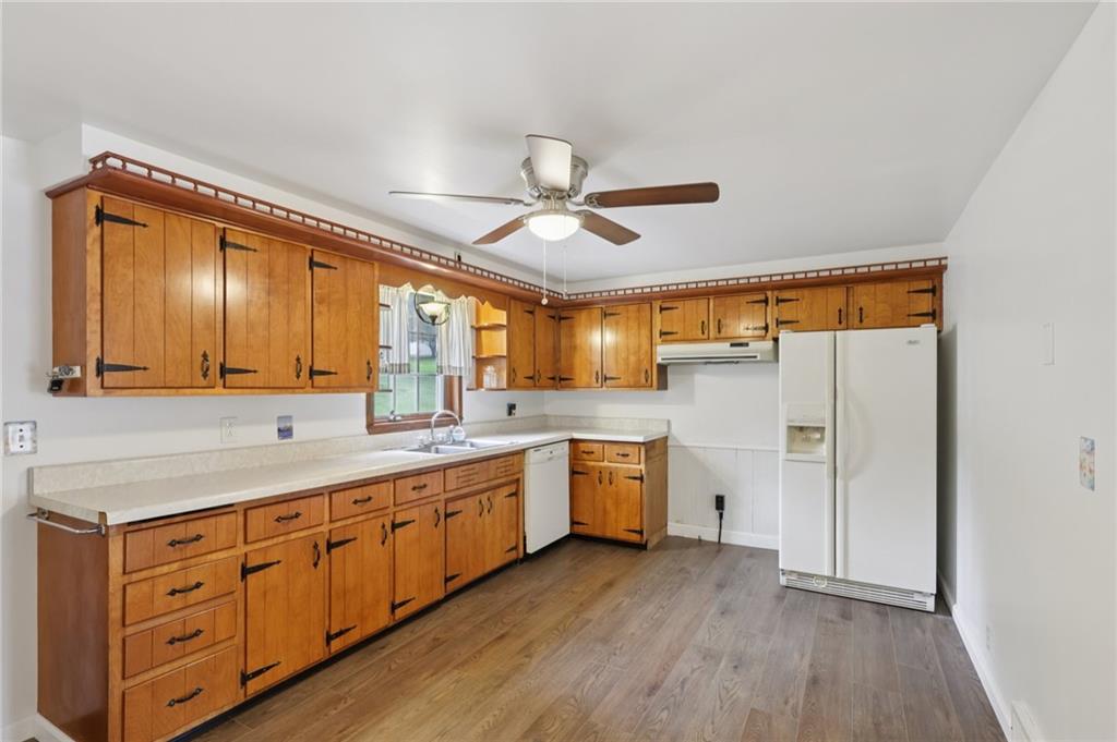 714 Colonial Drive Apollo, PA 15613 - Photo 6 of 32 a large kitchen with a lot of counter space and wooden floor