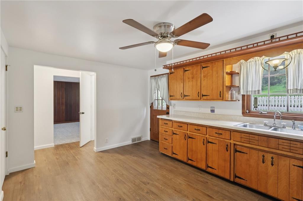 714 Colonial Drive Apollo, PA 15613 - Photo 8 of 32 a spacious bathroom with a double vanity sink a mirror and a bathtub