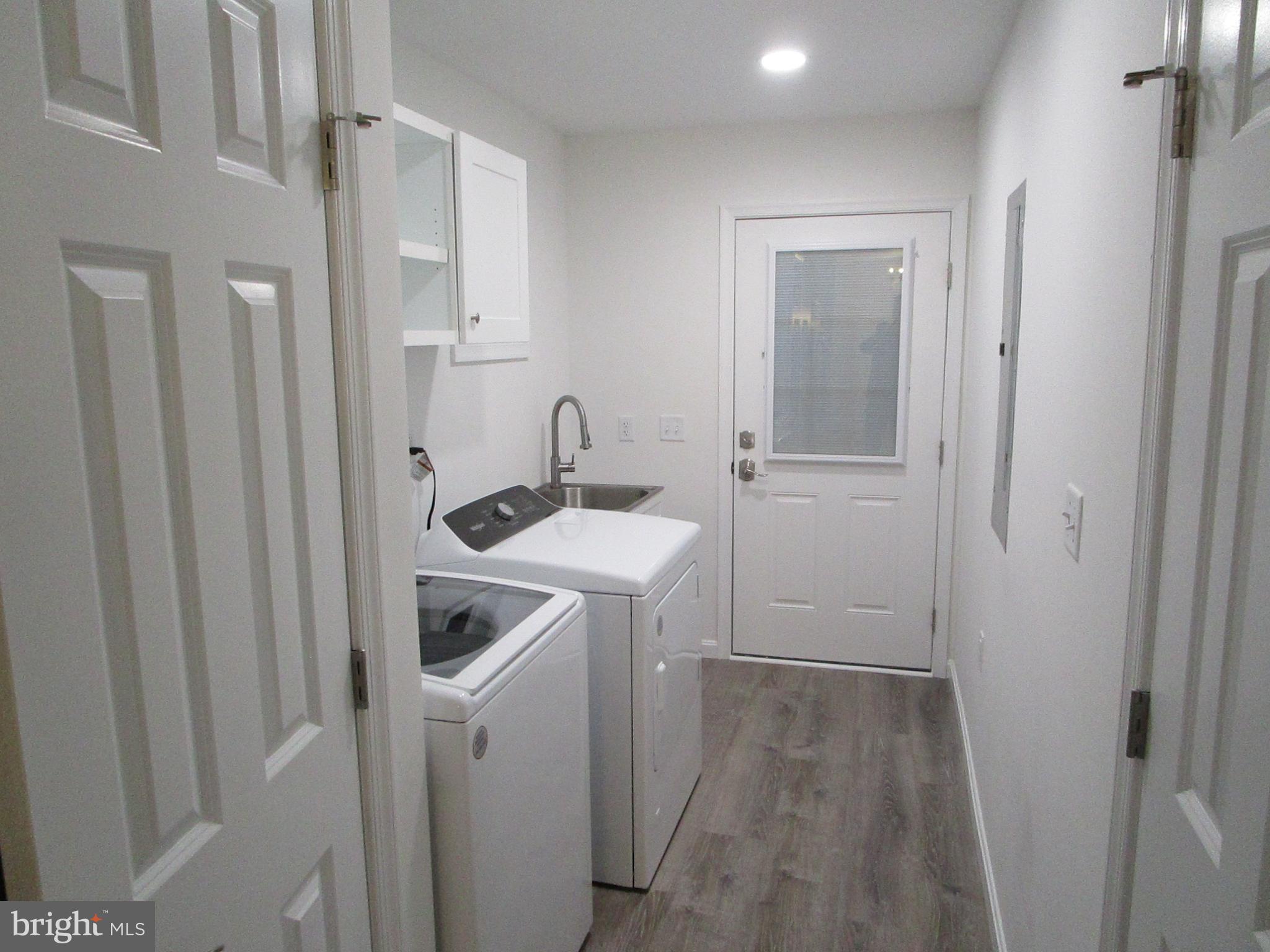 32 Tiffany Drive Rehoboth Beach, DE 19971 - Photo 21 of 43 a bathroom with a sink toilet and shower