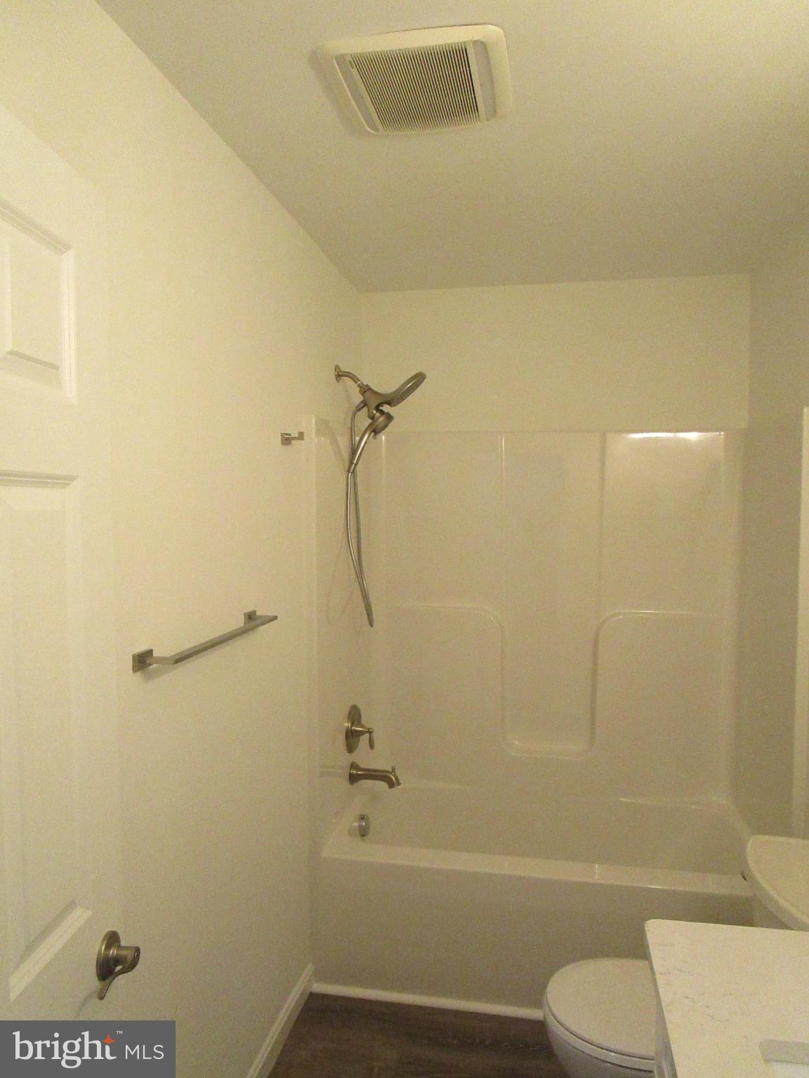 32 Tiffany Drive Rehoboth Beach, DE 19971 - Photo 33 of 43 a bathroom with a shower and toilet