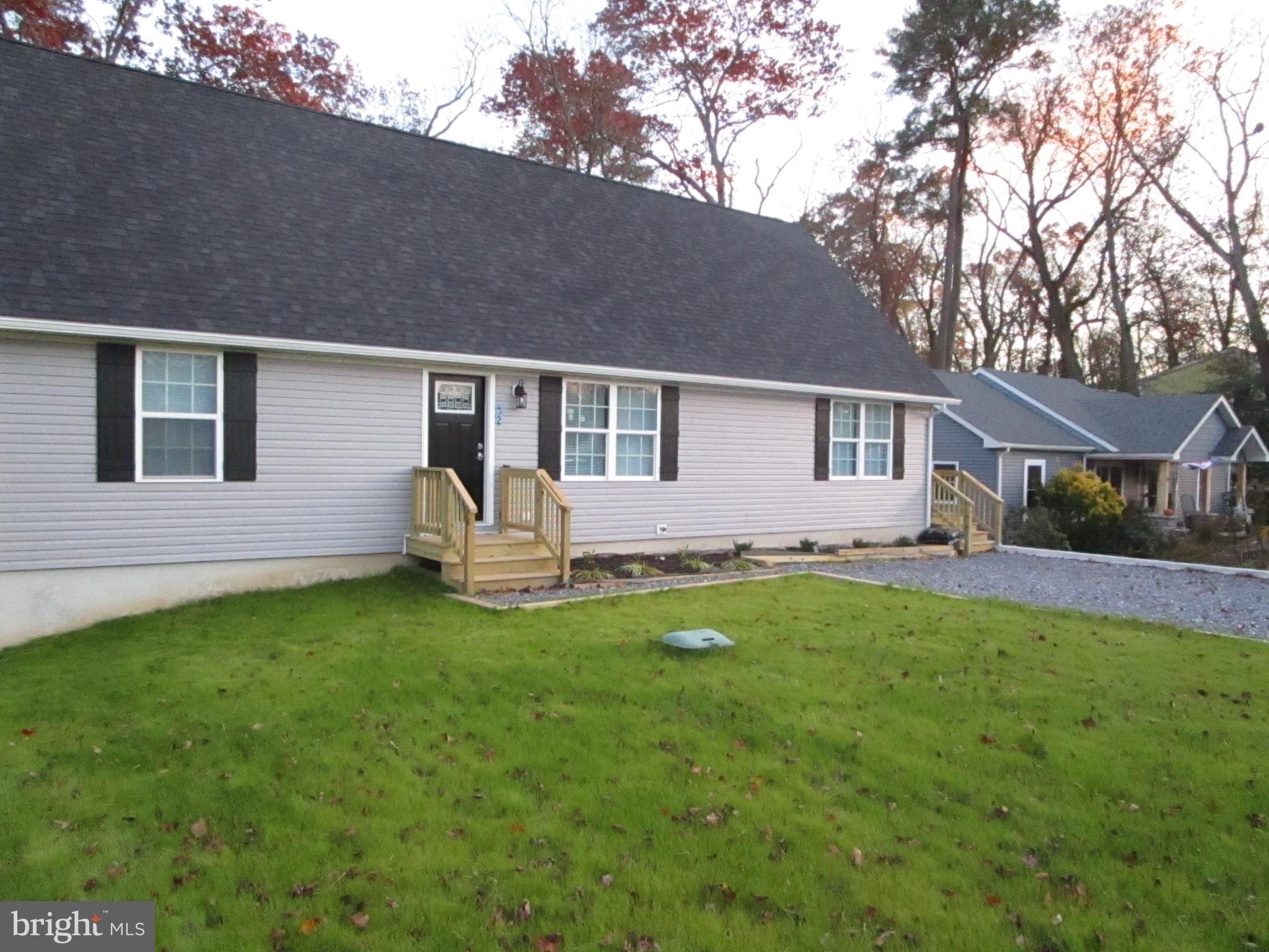 32 Tiffany Drive Rehoboth Beach, DE 19971 - Photo 40 of 43 a view of a house with backyard