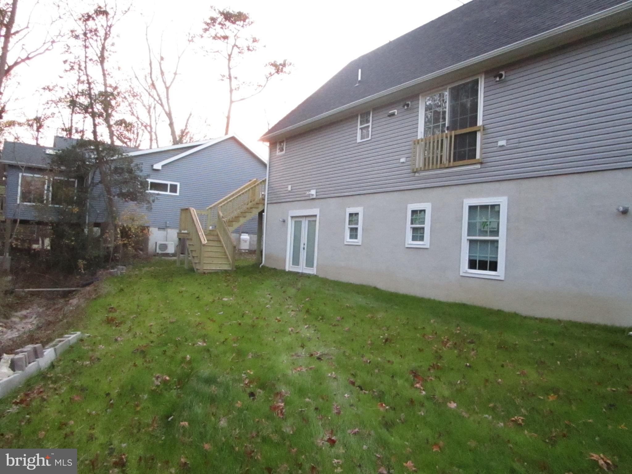 32 Tiffany Drive Rehoboth Beach, DE 19971 - Photo 6 of 43 a view of a house with backyard