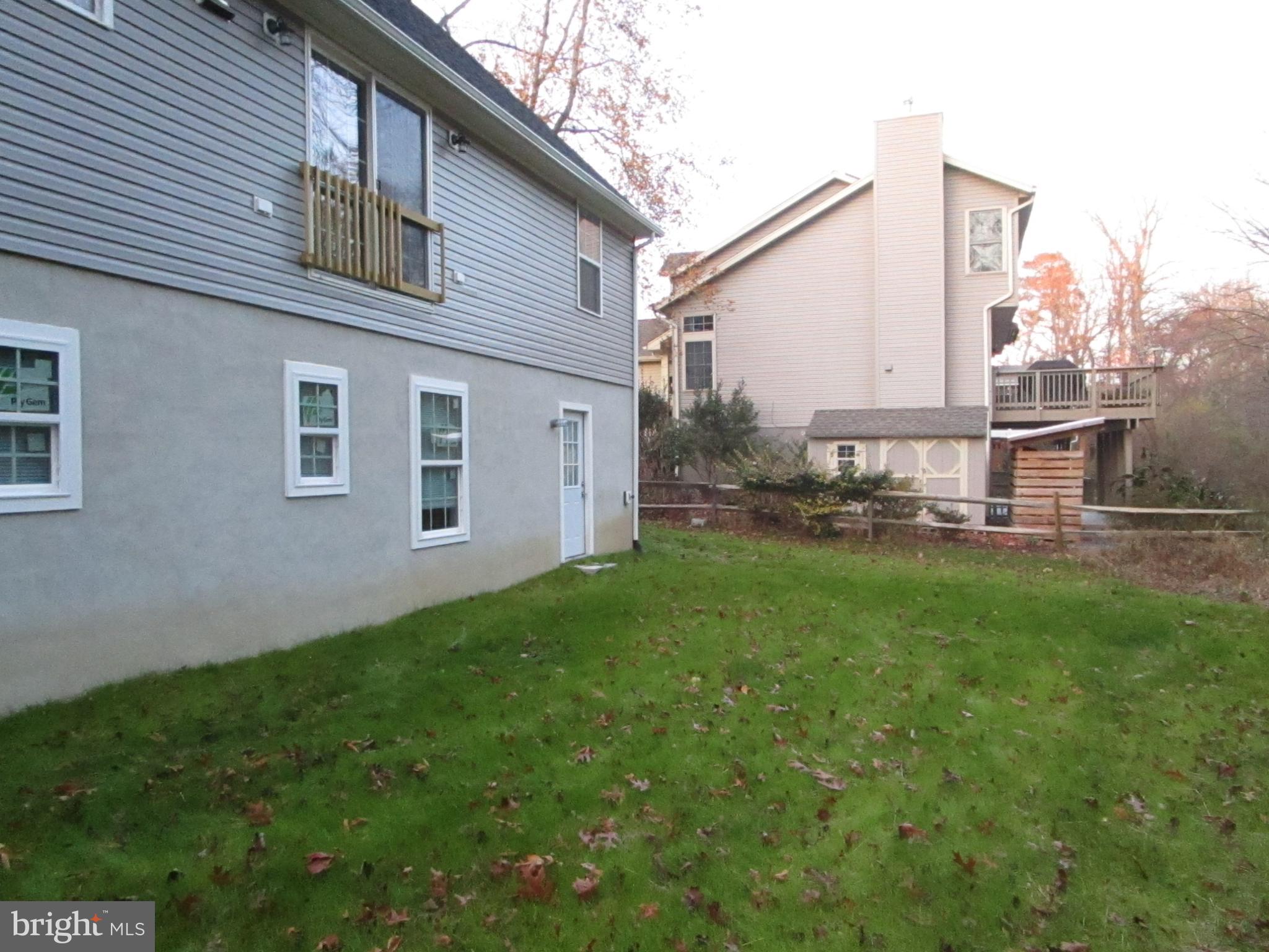 32 Tiffany Drive Rehoboth Beach, DE 19971 - Photo 7 of 43 a view of backyard of house with green space