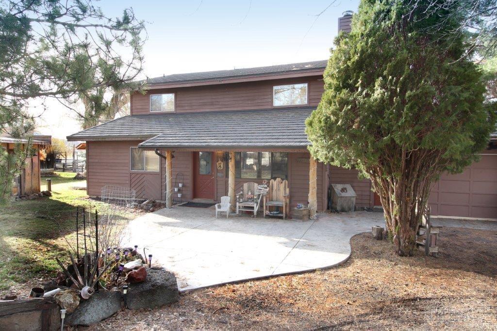 10473 Southwest Cornett Loop Powell Butte, OR 97753 - Photo 1 of 24 Front of home