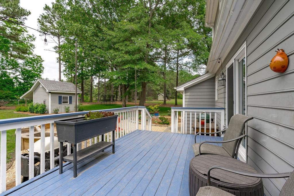 5208 Rivington Road Fuquay-Varina, NC 27526 - Photo 17 of 30 Rear Deck Overlooking Expansive Backyard