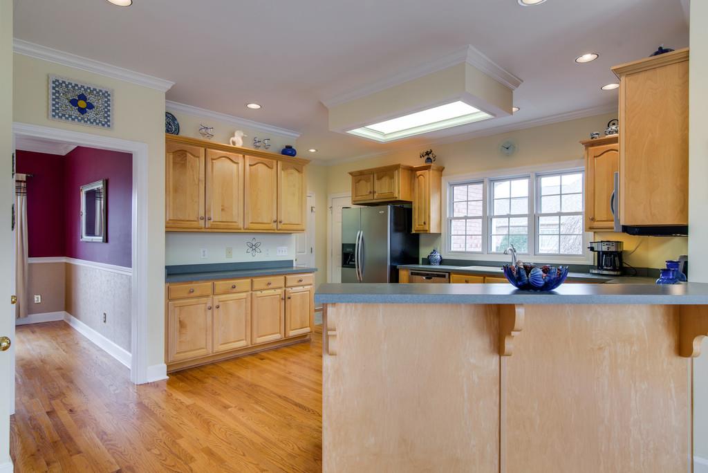 141 Mann Road Lebanon, TN 37087 - Photo 8 of 30 a kitchen with stainless steel appliances granite countertop a refrigerator a stove top oven a sink and dishwasher