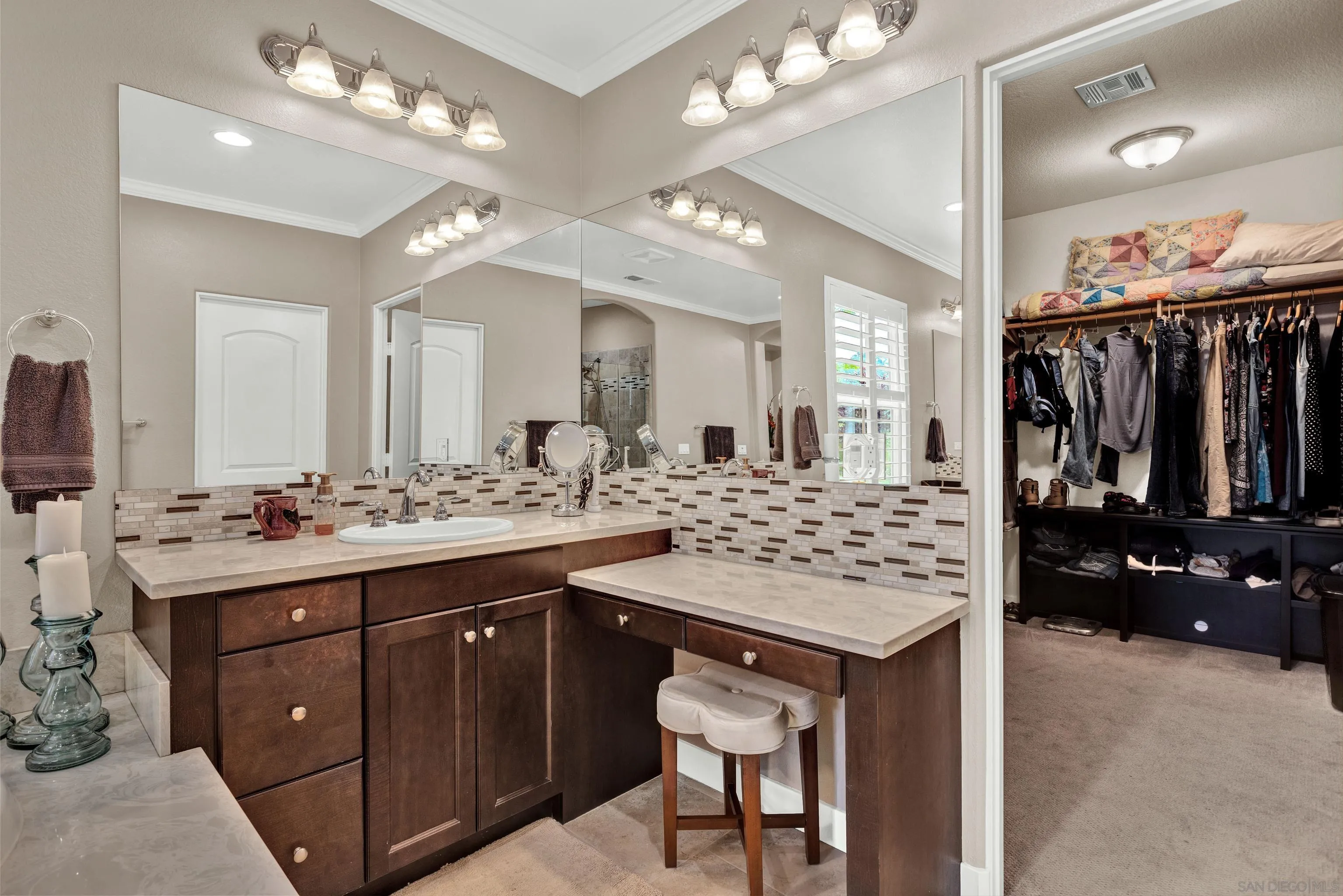 12884 Vineyard Crest Place Lakeside, CA 92040 - Photo 13 of 53 a bathroom with a sink vanity and a mirror