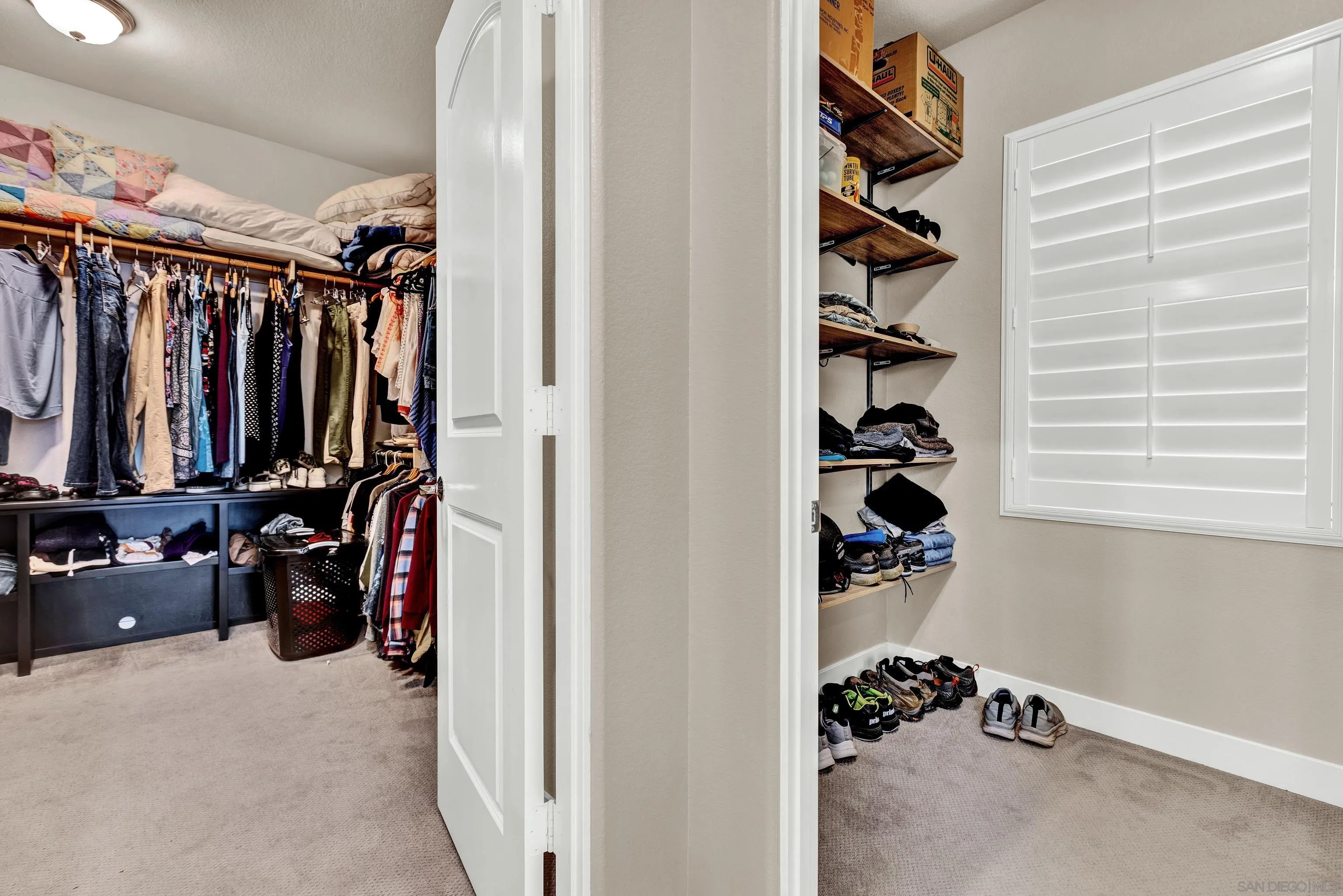 12884 Vineyard Crest Place Lakeside, CA 92040 - Photo 15 of 53 walk in closet with clothes and shoes