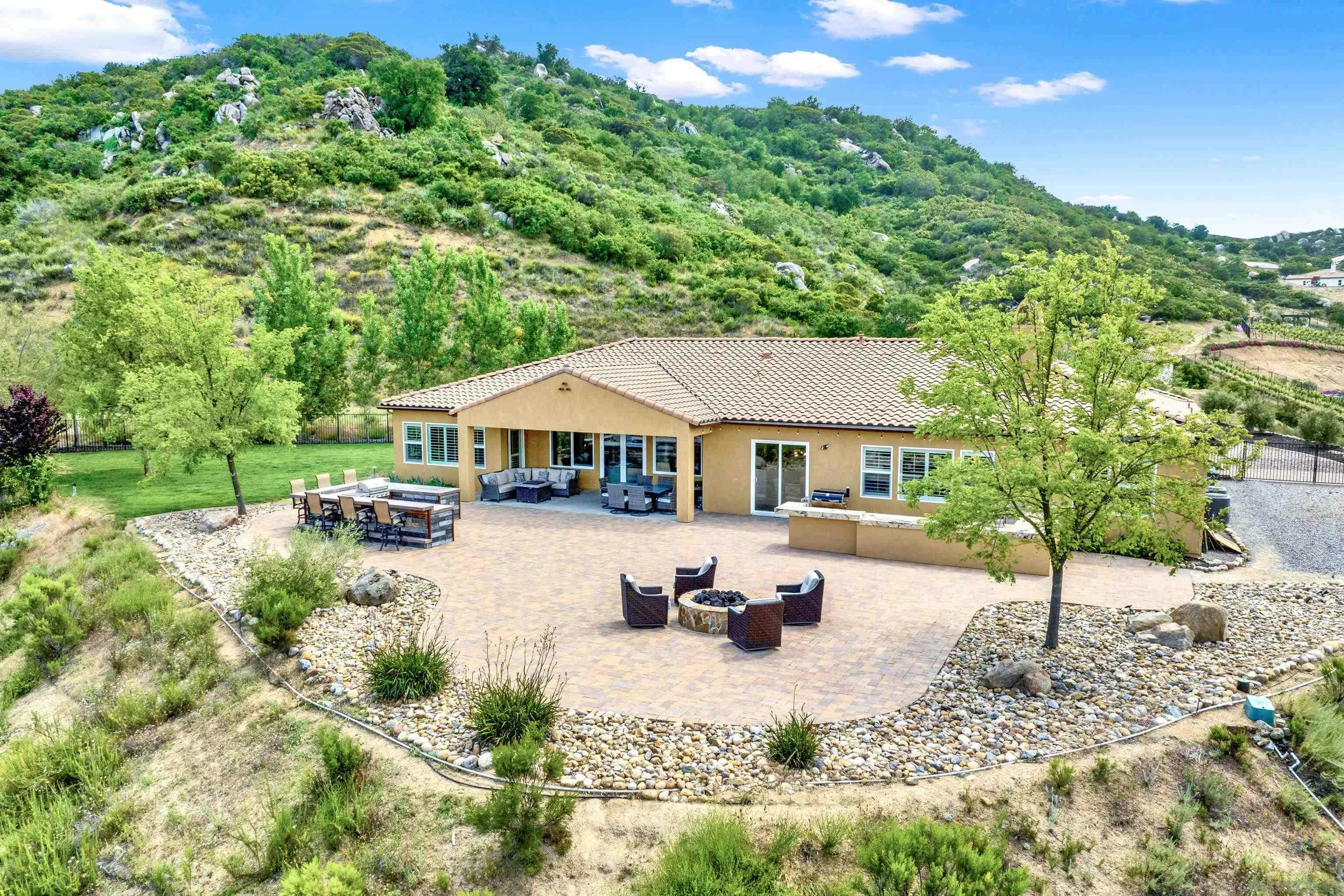 12884 Vineyard Crest Place Lakeside, CA 92040 - Photo 2 of 53 a view of house with yard outdoor seating and entertaining space