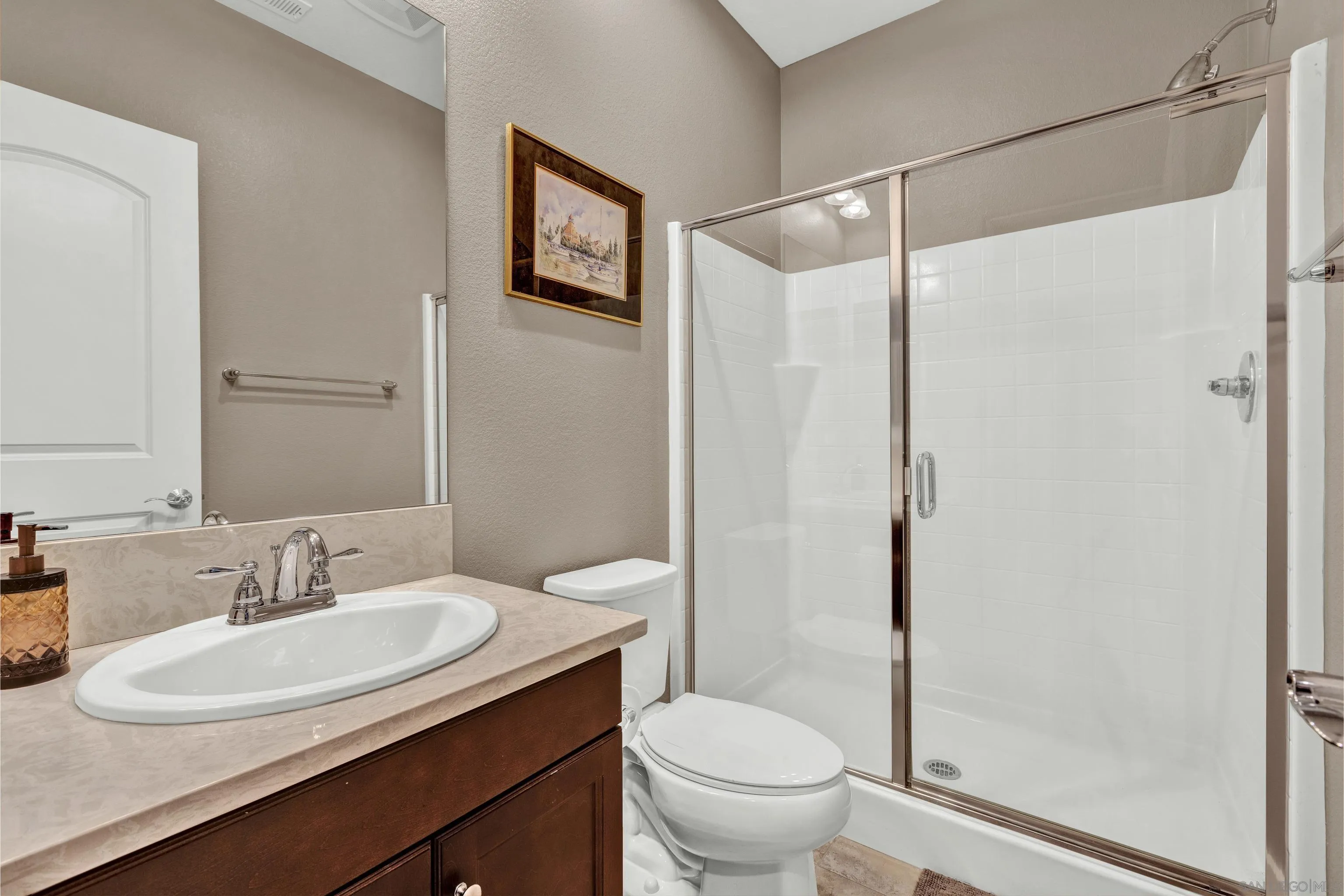 12884 Vineyard Crest Place Lakeside, CA 92040 - Photo 23 of 53 a bathroom with a sink toilet and shower