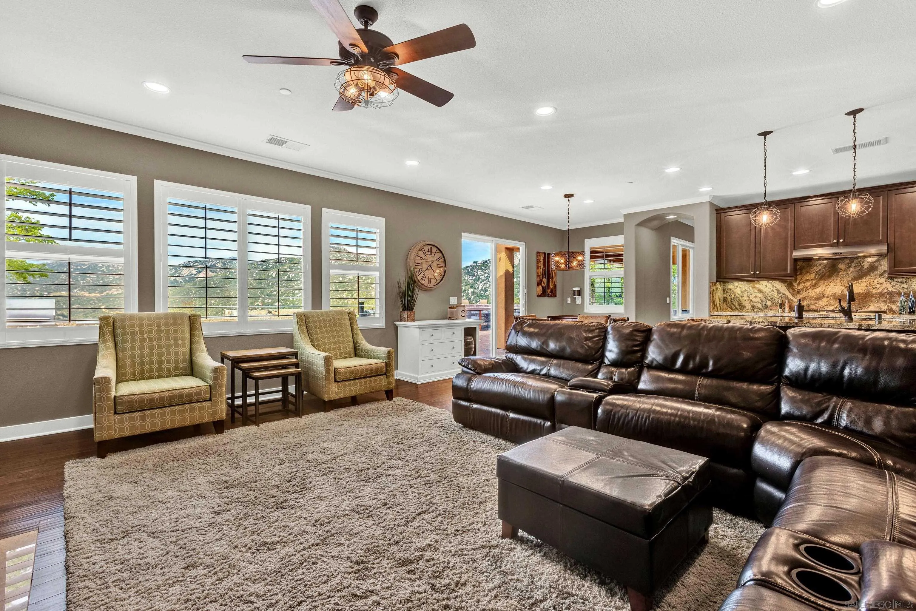 12884 Vineyard Crest Place Lakeside, CA 92040 - Photo 32 of 53 a living room with furniture and a large window