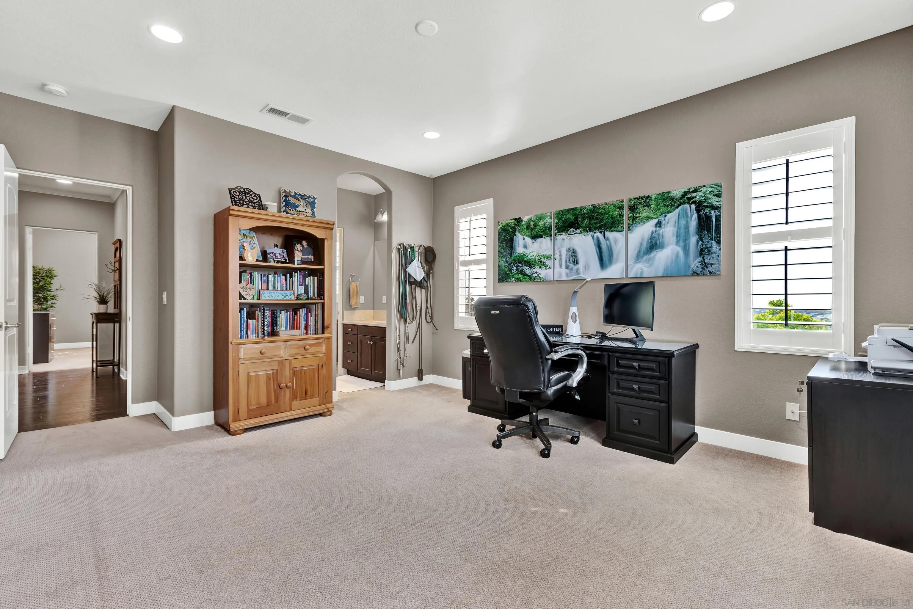 12884 Vineyard Crest Place Lakeside, CA 92040 - Photo 38 of 53 a view of a workspace with furniture and a window