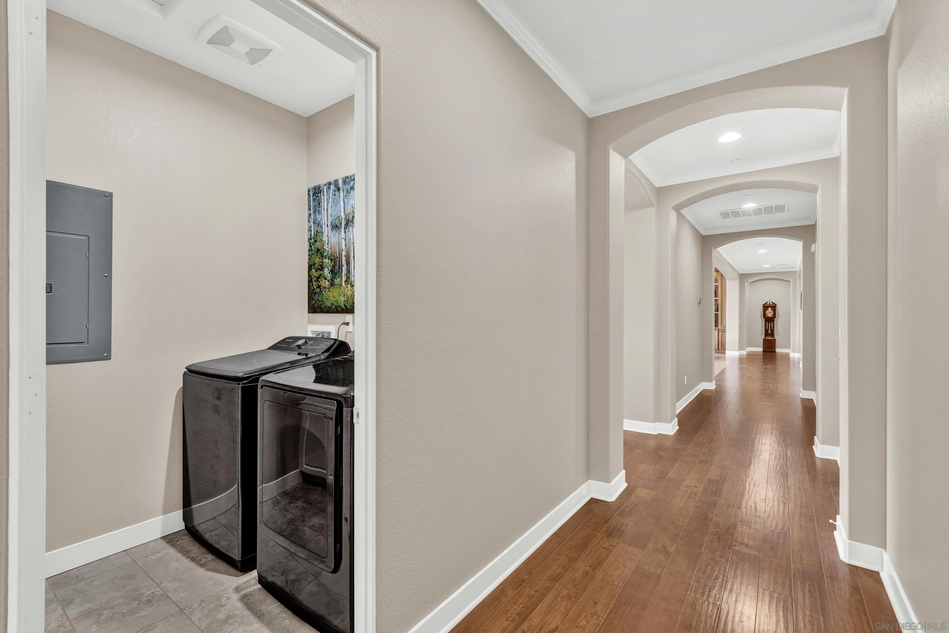 12884 Vineyard Crest Place Lakeside, CA 92040 - Photo 40 of 53 a view of a hallway with wooden floor and staircase