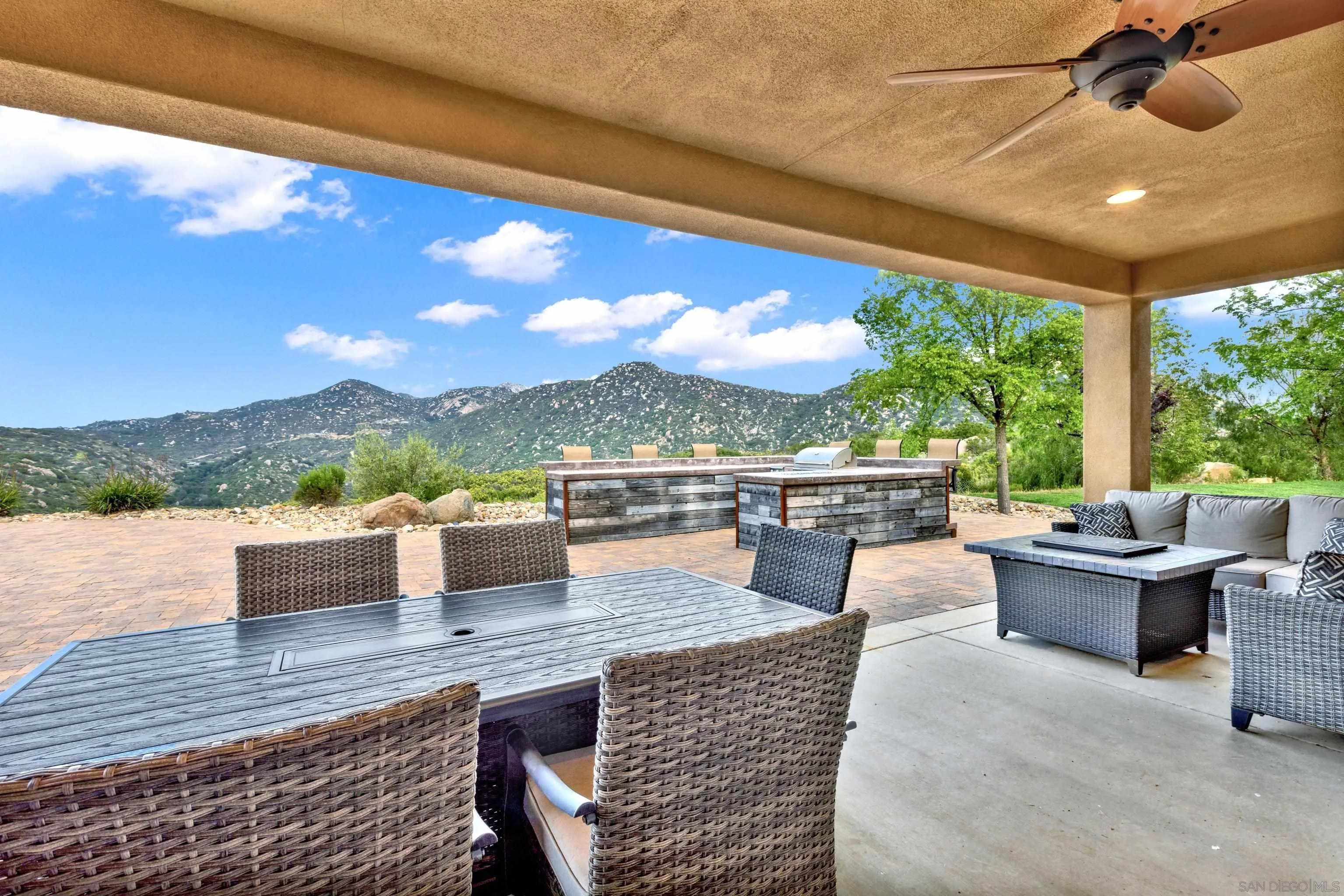12884 Vineyard Crest Place Lakeside, CA 92040 - Photo 43 of 53 a view of a terrace with couches and pool