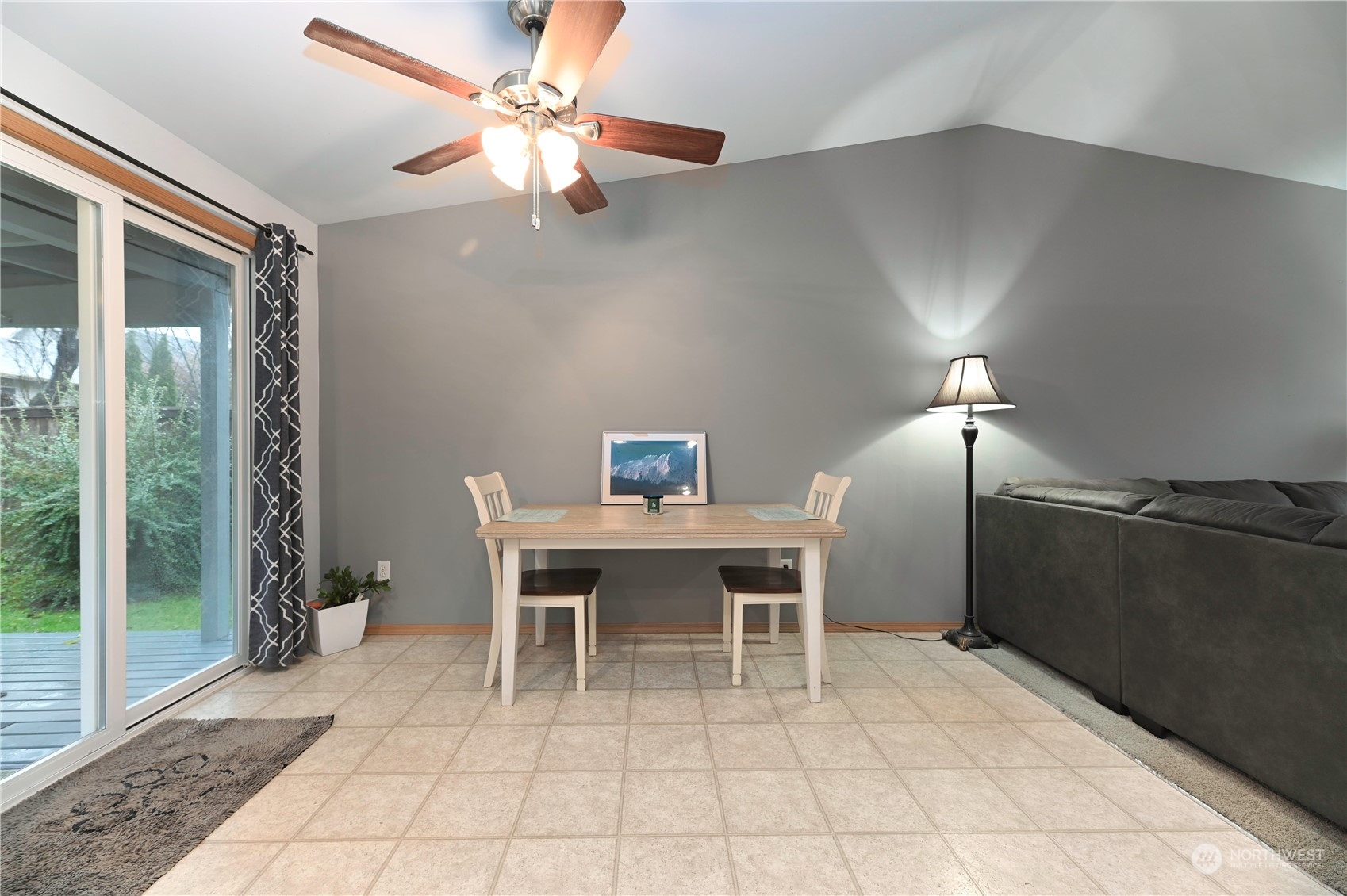 1105 Kessler Drive Sultan, WA 98294 - Photo 12 of 25 a dining room with furniture and a chandelier fan