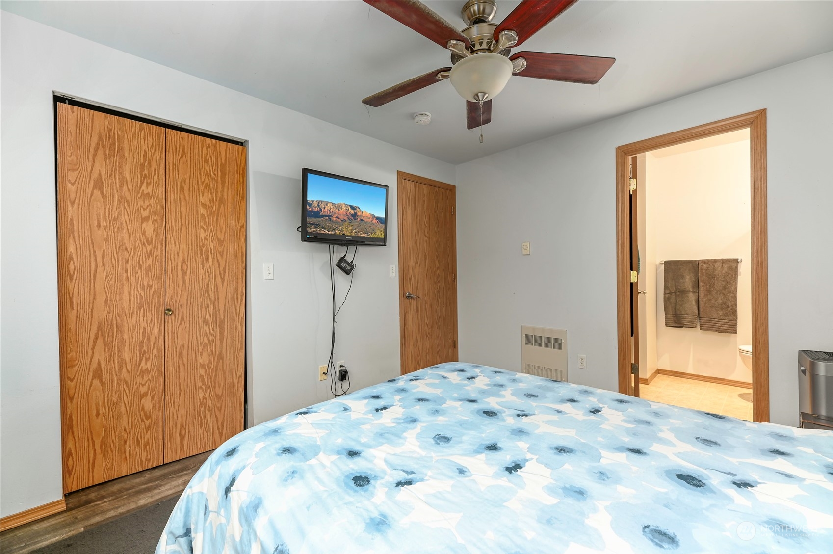 1105 Kessler Drive Sultan, WA 98294 - Photo 14 of 25 a bedroom with a bed and a flat screen tv