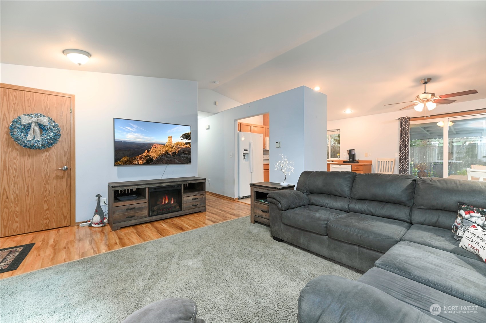 1105 Kessler Drive Sultan, WA 98294 - Photo 5 of 25 a living room with furniture and a flat screen tv