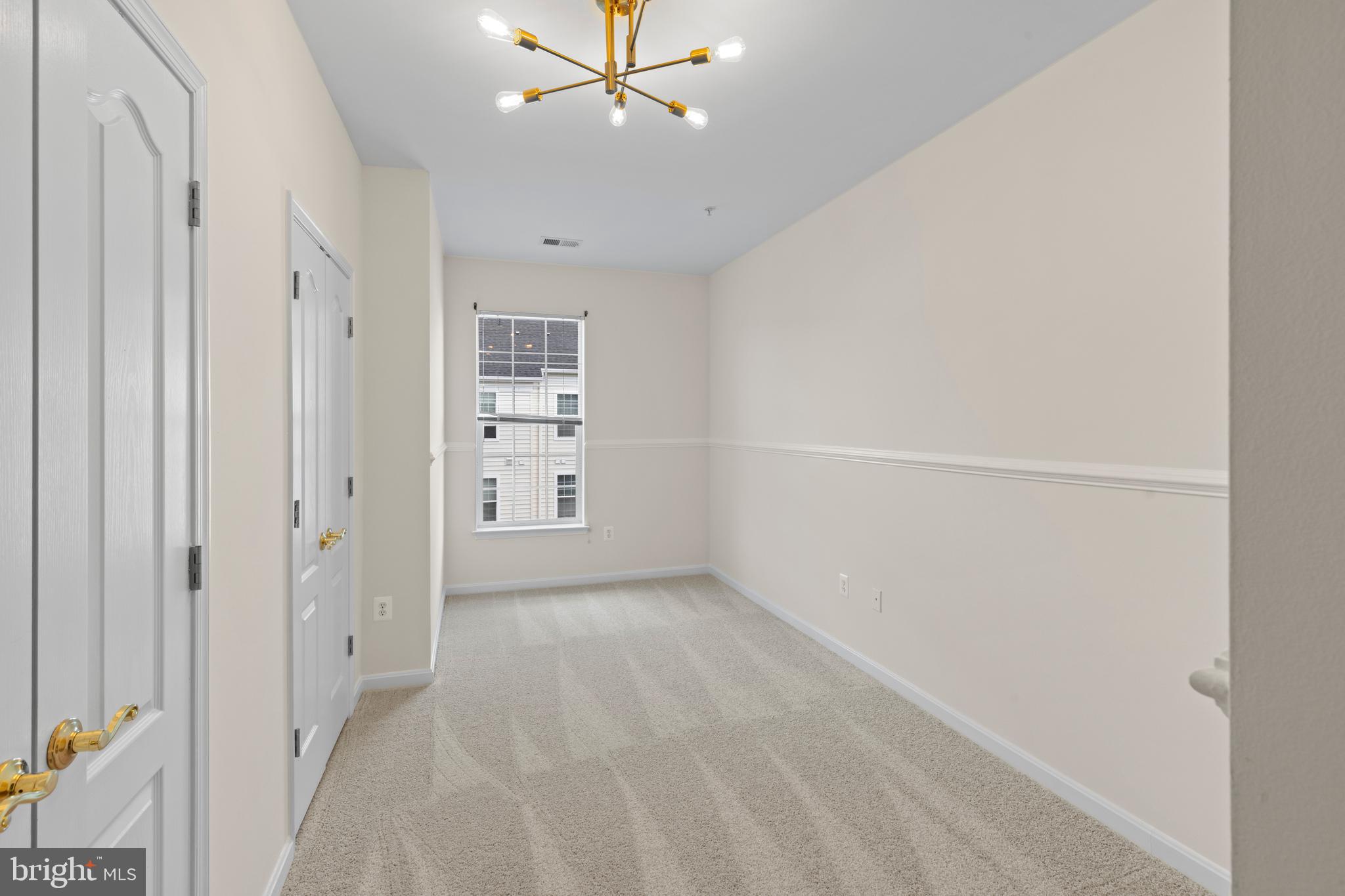 7315 Brookview Road, Unit 407 Elkridge, MD 21075 - Photo 20 of 33 a view of an empty room