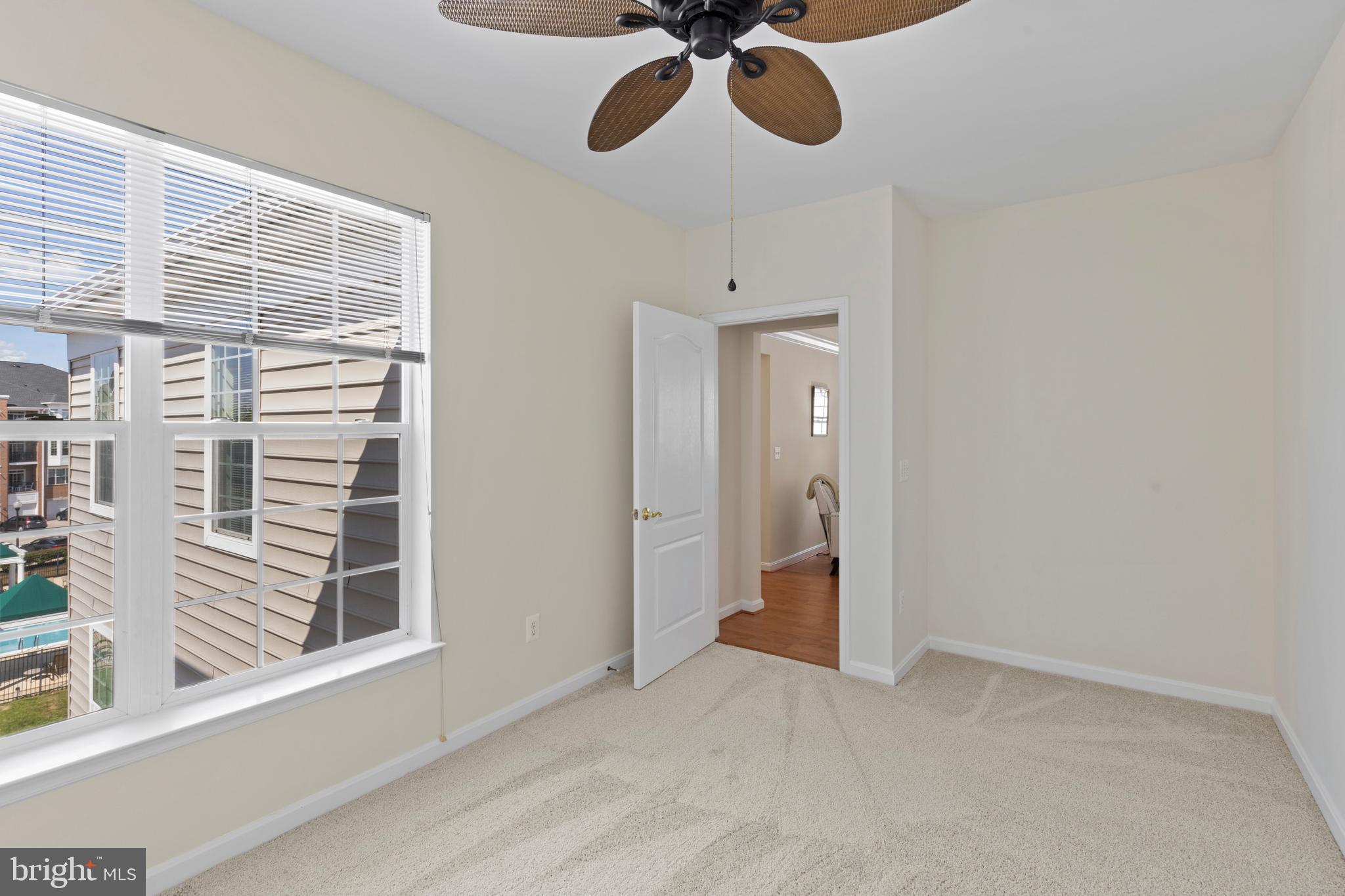 7315 Brookview Road, Unit 407 Elkridge, MD 21075 - Photo 24 of 33 a view of a room with a air conditioner and windows