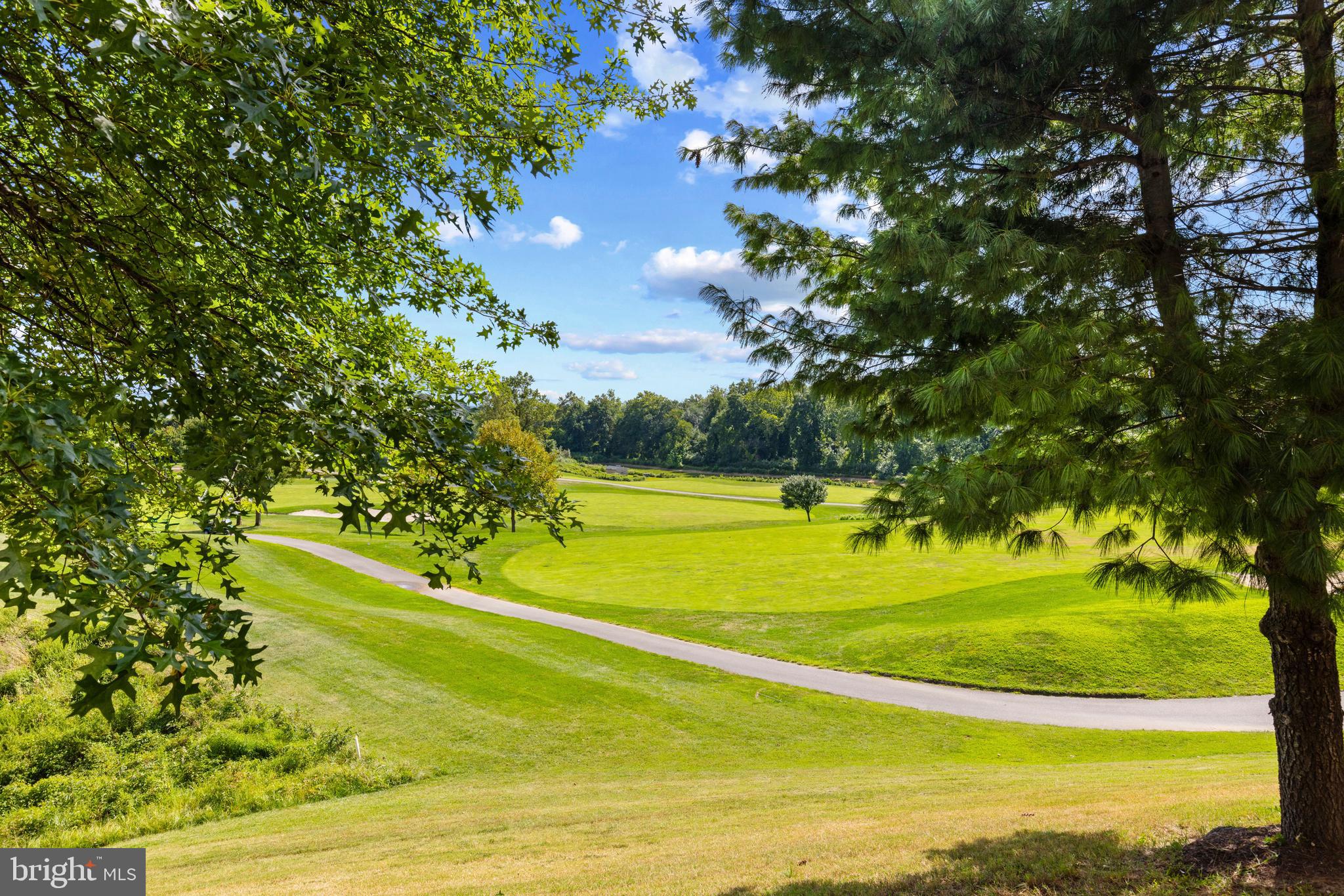 7315 Brookview Road, Unit 407 Elkridge, MD 21075 - Photo 32 of 33 a view of a swimming pool with a yard