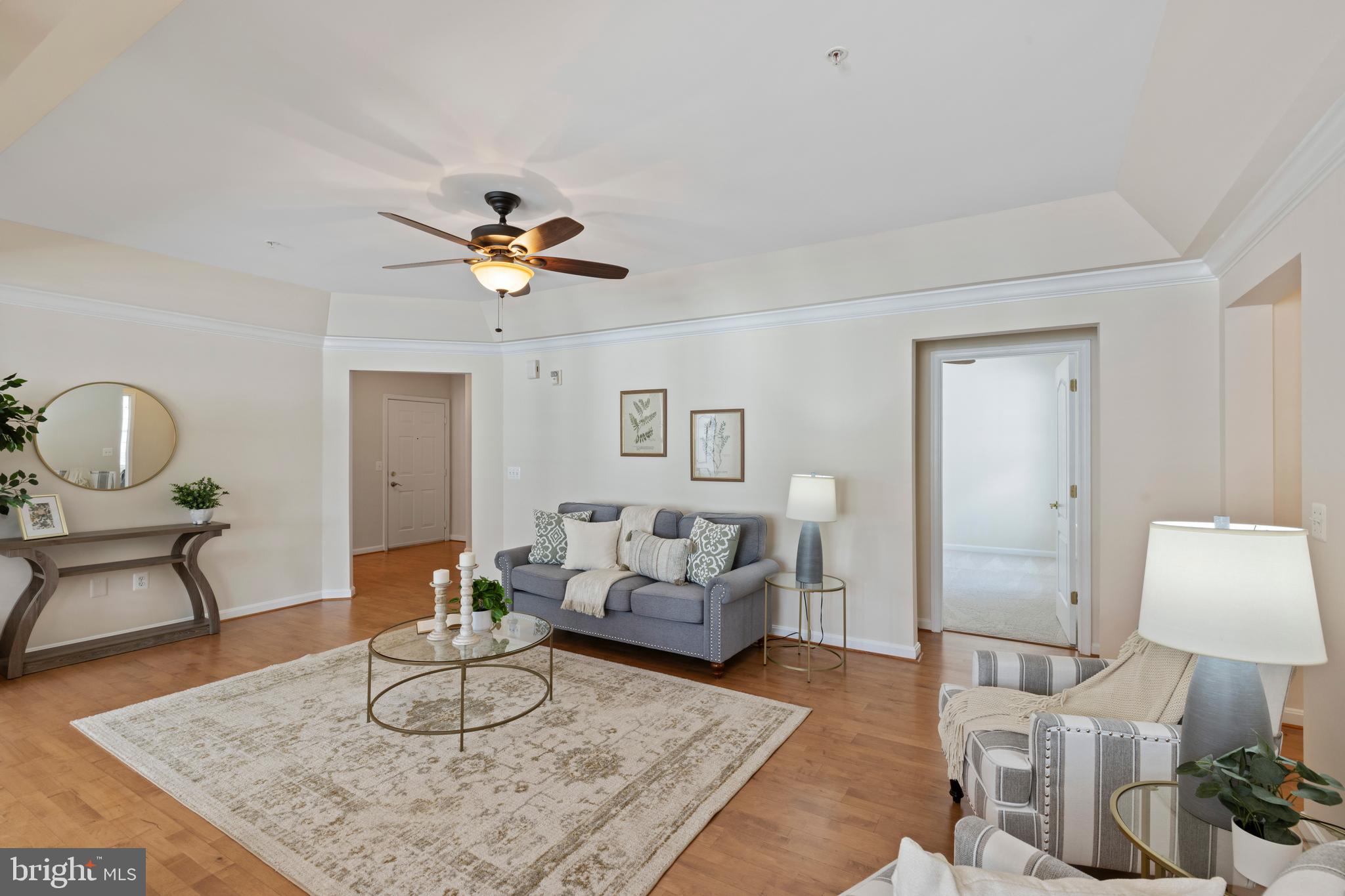 7315 Brookview Road, Unit 407 Elkridge, MD 21075 - Photo 8 of 33 a living room with furniture and a table
