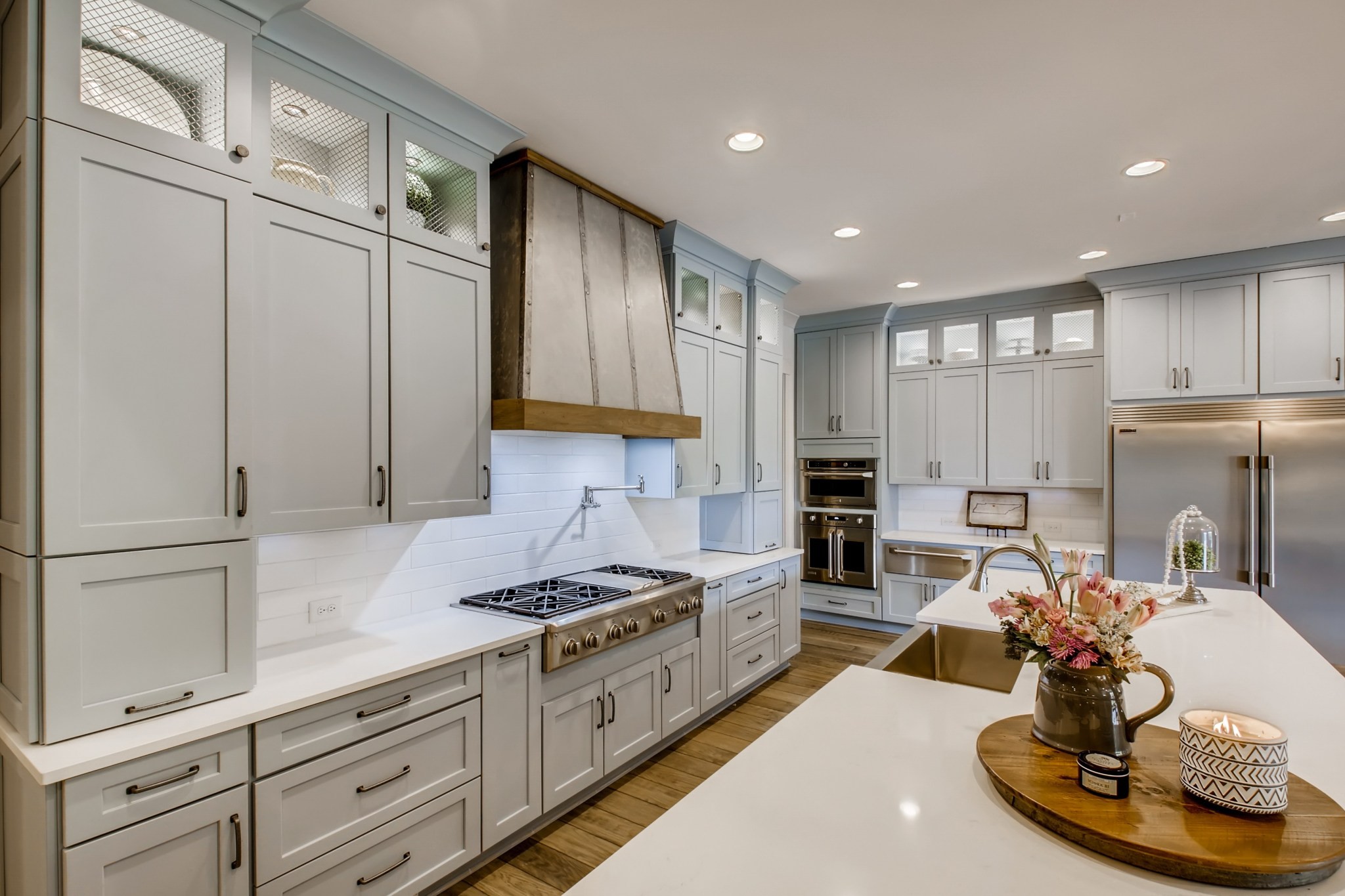 637 Legends Crest Drive Franklin, TN 37069 - Photo 13 of 50 a kitchen with cabinets a sink and appliances