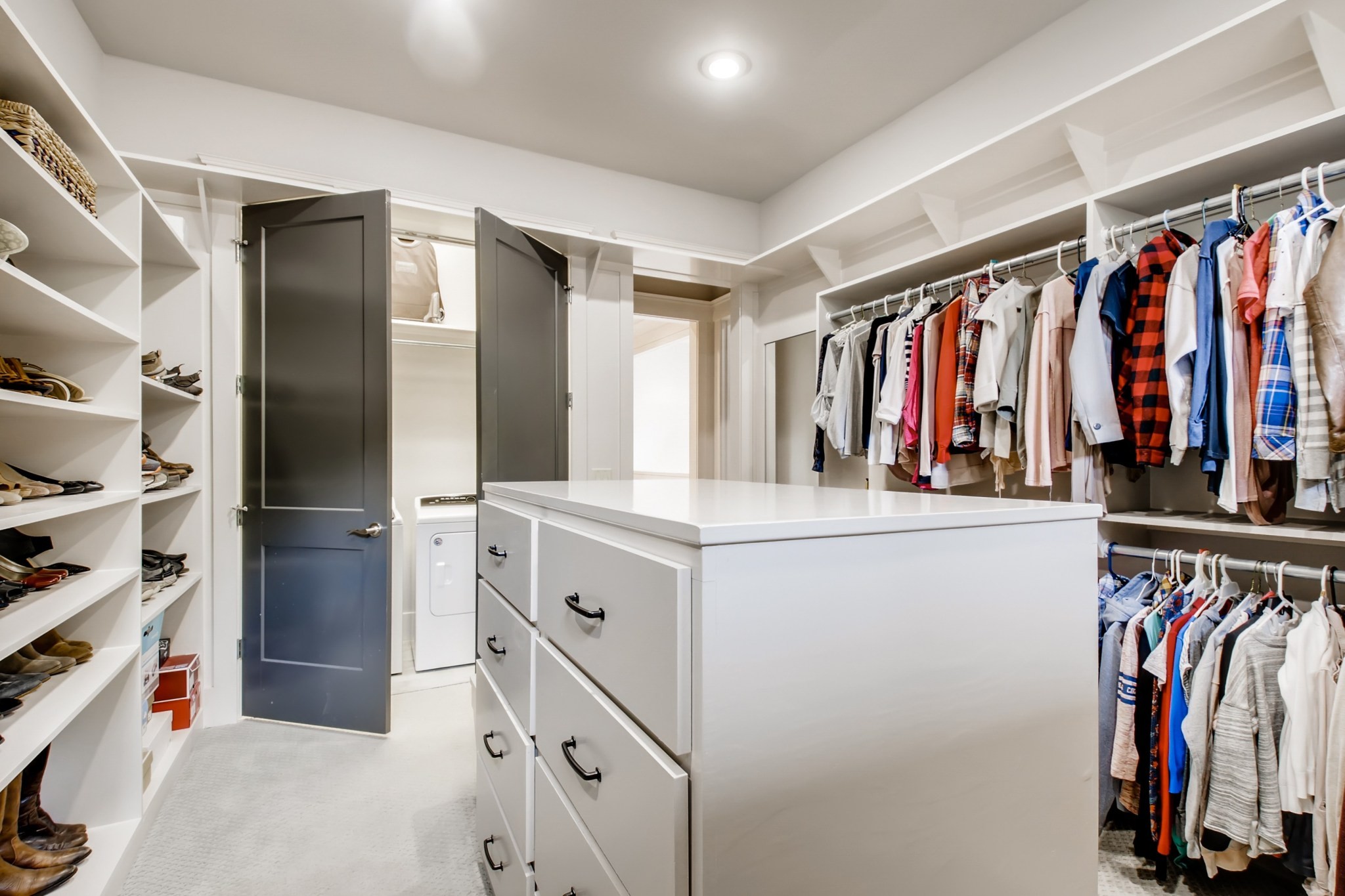 637 Legends Crest Drive Franklin, TN 37069 - Photo 26 of 50 a view of walk in closet with clothes and shoes